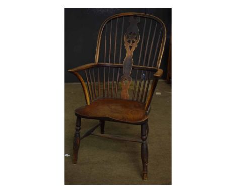 Late 18th/early 19th century elm and ash stick back Windsor chair with central splat, with pierced wheel design on four turne