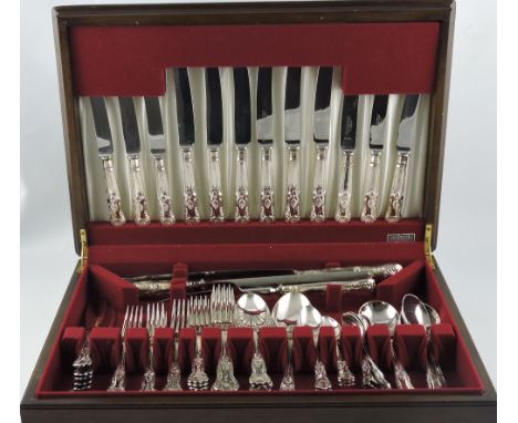 A silver-plated Kings pattern cutlery service, for six place settings, including carving tools and fish eaters, within a fitt