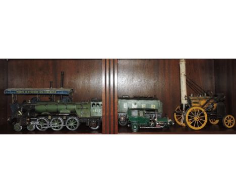 A painted tinplate model of The Flying Scotsman, with Tender, L.67cm, together with a similar model of Stephenson's Rocket, a