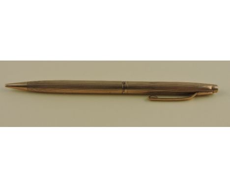 A Truscraft 9ct gold rotary pencil, S.J. Rose, Birmingham  1960, engine turned finish.