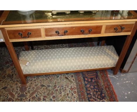 A Victorian upholstered fender stool on later turned feet, together with a reproduction Georgian design mahogany tripod wine 