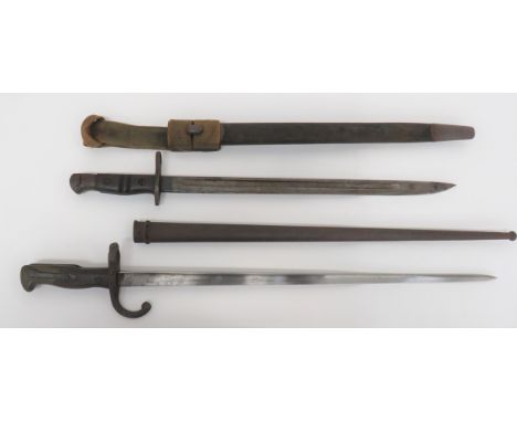 British P13 Bayonet and French M1874 Gras BayonetP13 bayonet.  17 inch, single edged blade with fuller.  The forte with maker