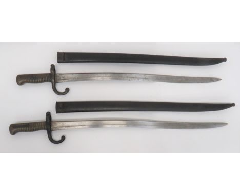 Two French Chassepot Bayonets22 1/2 inch, single edged, yataghan blade with large fuller.  Spine with maker dated 1868.  Stee