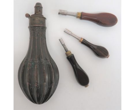 Hawksley Powder Flask and Various Gun Toolsconsisting a browned, fluted and foliage design flask.  Brass top with external sp