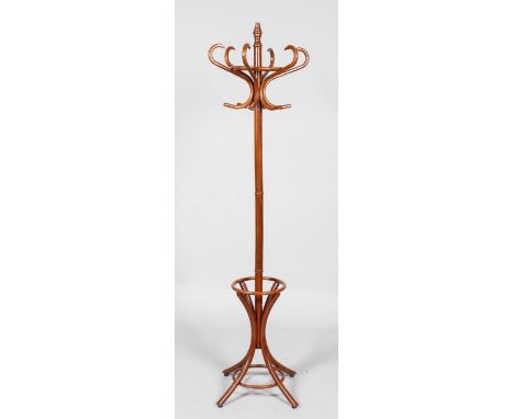 A stained turned wood coat stand, in the Victorian style, with six S shaped hooks issuing from the turned upper section, the 