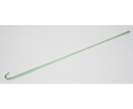 A Victorian glass walking stick, of pale greenish tint, spirally twisted, 130cm long