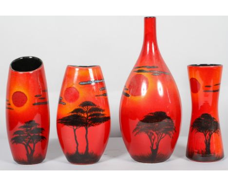 A Poole pottery 'Sonnet Sky' pattern slender ovoid vase with narrow neck, 38cm high, and three further Poole pottery vases in