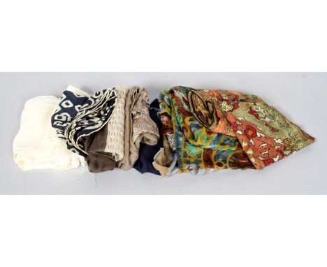 A collection of eight vintage ladies silk scarves, to include a Giorgio Armani navy and cream example, another with cream lat