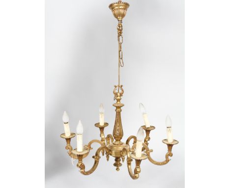 An early 20th century six branch ceiling light, with scrolled supports, 47cm high x 63cm wide