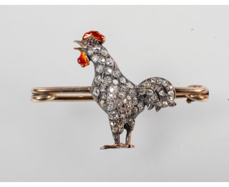 A yellow and white metal bar brooch. Having a cockerel design set with old European and rose cut diamonds and finished with a