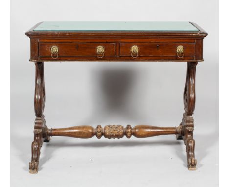 A William IV mahogany sofa table, circa 1830, with two frieze drawers with gilt metal lion and ring handles, the top mounted 