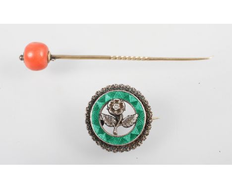 A yellow gold stick pin with coral (untested) bead together with a Charles Horner sterling silver enamelled brooch. Gross wei