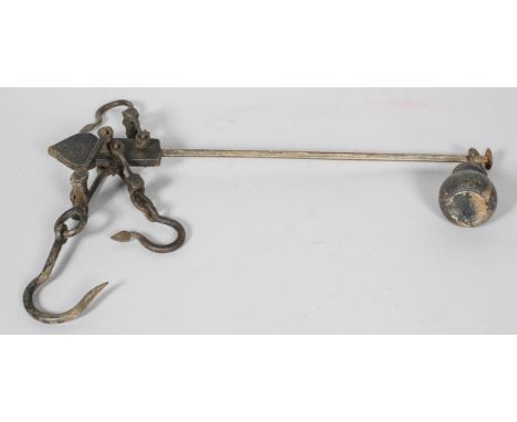 A Victorian cast iron weighing scale, late 19th century, stamped 150/871, with ball weight and three hinged hooks on spade ca