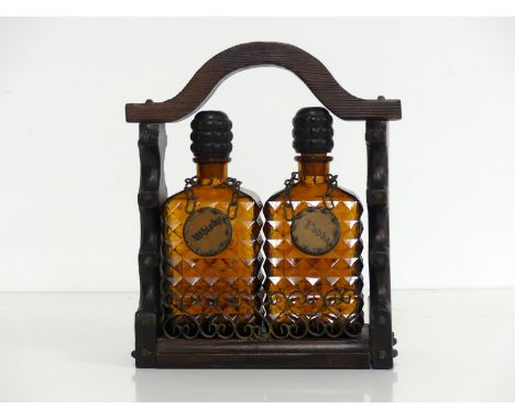 2 Brown Glass Decanters with Whisky and Vodka Neck Tags in carved wooden Tantalus