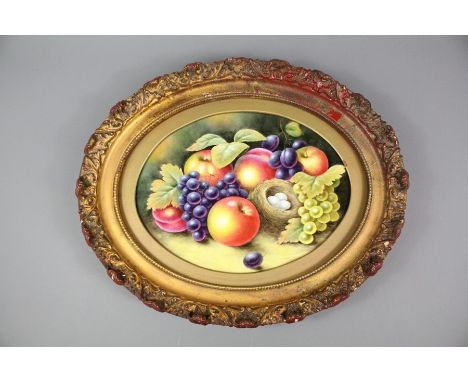 Clermont oval porcelain plaque; still life in fruit, painted by J.F. Smith (Royal Worcester), approx 23 x 30 cms (io).&nbsp;