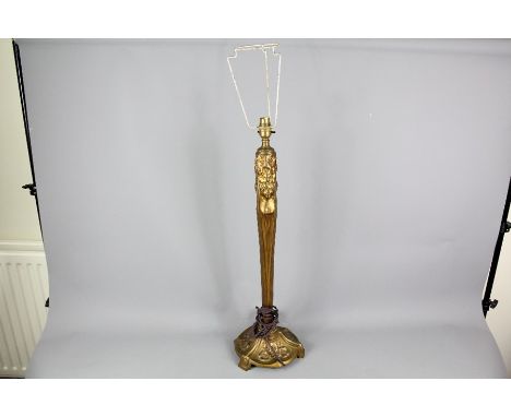 A French Art Nouveau brass gilt brass lamp stand, moulded with blossom and a feminine bust, approx 70 cms h.&nbsp;