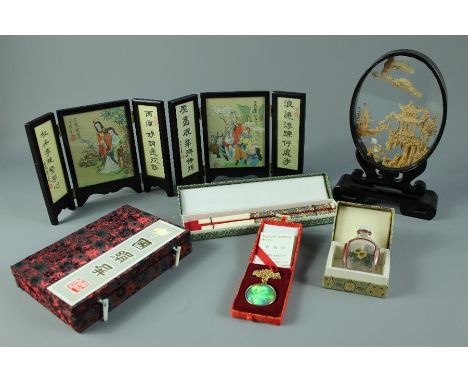 Miscellaneous Chinese Items, including an Oriental cork carving; the sculpture depicting a pagoda, in perspex frame on stand,