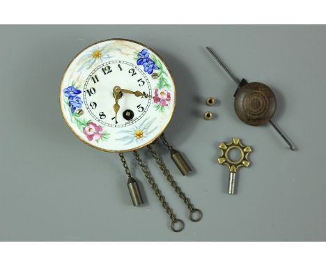 Vintage Wintermantel pendulette miniature wall clock, movement stamped Wintermantel, white floral enamel clock face with weig