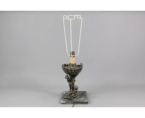 After Charles Perron pewter lamp stand, supported on a square marble base, approx 27 cms h.