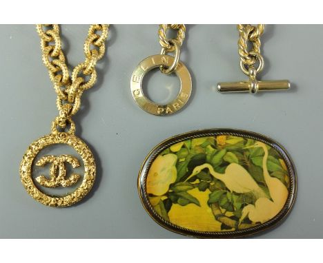 French cosmetic jewellery, including a Chanel yellow metal necklace with Chanel motif pendant approx 54 cms l together with a
