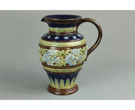 Late 19th century Doulton Lambeth pitcher, nr 9585, inscribed L.W (L. Waters), approx 24 cms h, with floral band heightened w