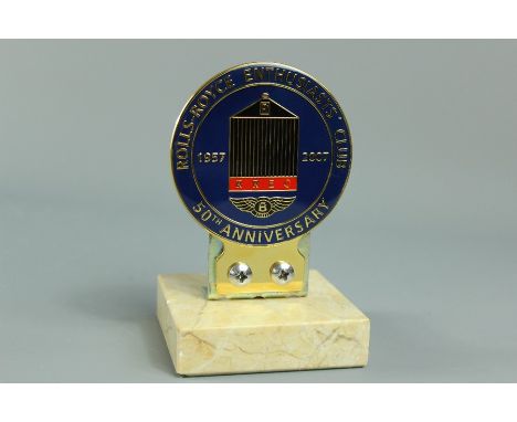 A metal and enamel Rolls Royce car mascot,&nbsp; the mascot reads "Rolls-Royce Enthusiasts Club 1957 - 2007 50th Anniversary"