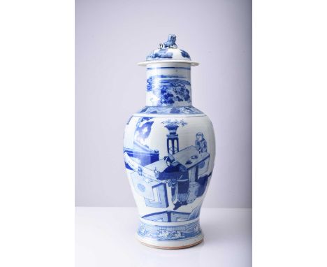 A Chinese blue and white vase and cover, late Qing DynastyOf ovoid form and decorated in the Kangxi style with scholars writi