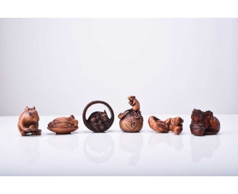 A group of six Japanese carved wood netsuke modelled as rats, 20th centuryNaturalistically carved and inset with horn eyes, s