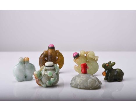 A group of six Chinese jade and hardstone snuff bottles, 19th/20th centuryIncluding twin fish, gourd with bat and monkey, twi