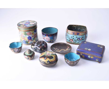 An assembled group of Chinese cloisonne, 19th/early 20th centuryIncluding boxes, bowls and a dish, variously decorated with d