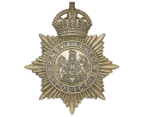 South Africa. Transvaal Town Police helmet plate circa 1902-08.A good scarce die-stamped white metal example. Crowned star be