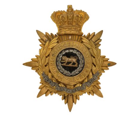 Hampshire Regiment Victorian Officer’s helmet plate circa 1881-1901.A good gilt example. Crowned star mounted with laurel spr