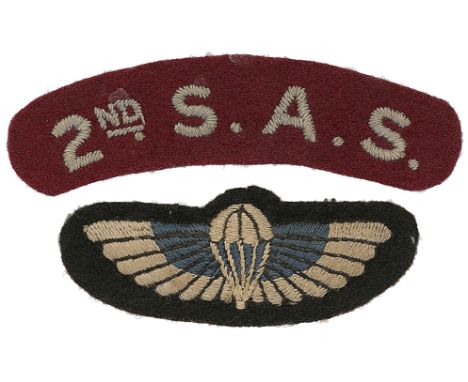 2nd S.A.S. attributed WW2 Special Air Service cloth shoulder title and a parachute wing.A good rare cloth shoulder title. Lig