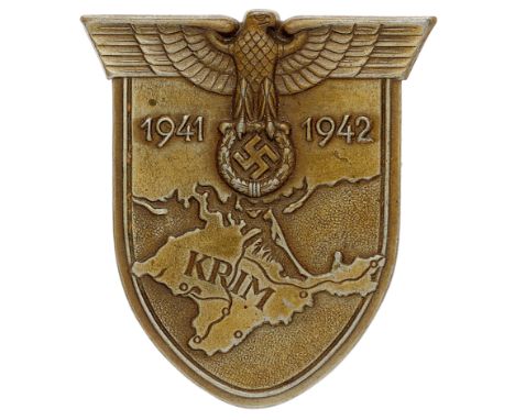 German Third Reich WW2 Army / Waffen SS issue Krim arm shield.A good bronzed example. Eagle and swastika on shield bearing th