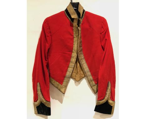 5th Dragoon Guards Officer’s Mess uniform.An example of stable pattern form, scarlet Melton cloth with dark blue velvet facin