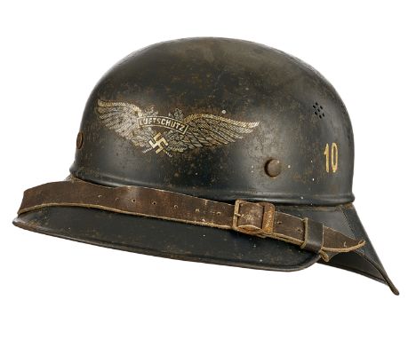 German Third Reich WW2 Luftschutz “Gladiator” Pattern HelmetA good example. Dark blue painted finish with clear transfer of w