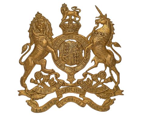 Royal Engineers Officer’s helmet plate circa 1901-14.A good die-stamped gilt example. Royal Arms, pierced around the shield, 