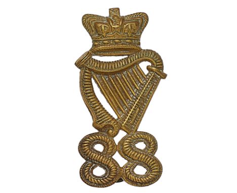 Irish. 88th (Connaught Rangers) Regiment OR’s forage cap badge circa 1871-79.A good scarce die-stamped brass example. Crowned