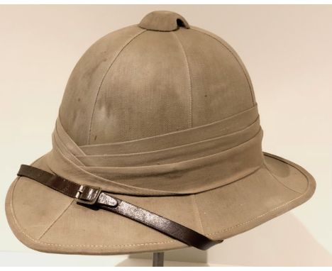 WW2 1942 Wolseley Pattern Foreign Service HelmetA good issue example of khaki cloth. The interior complete with leather sweat