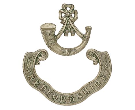 Bedfordshire Militia Victorian OR’s scroll pattern forage cap badge circa 1858-74.A good scarce die-stamped white metal two p