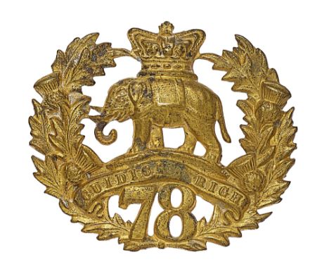 Scottish. 78th Highland Regiment (or Ross-shire Buffs) OR’s glengarry badge circa 1862-81.A die-stamped smaller brass example