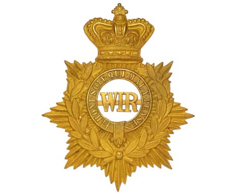 West India Regiment Victorian senior NCO’s helmet plate circa 1878-81.A fine scarce rich gilt example. Crowned star bearing l