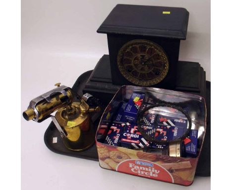 Victorian mantel clock, blow torch, Gladstone marble knife, inkwell, lamp and twelve corgis. A condition report is not availa