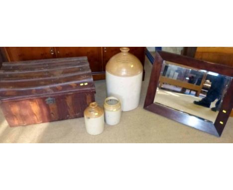 Old tin trunk, bevel edge mirror and three stone jars. A condition report is not available for this lot.  Damage, defects, re