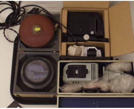 Aco boxed m.o.d. compass, Rabone 100' tape measure, Romanslide projector and Kodaslide projector. A condition report is not a