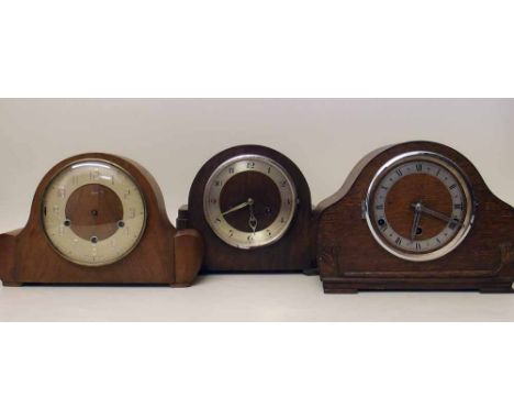 Three mid 20th century mantel clocks. A condition report is not available for this lot.  Damage, defects, restoration or othe