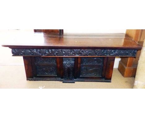 Heavily carved oak sideboard/buffet. A condition report is not available for this lot.  Damage, defects, restoration or other
