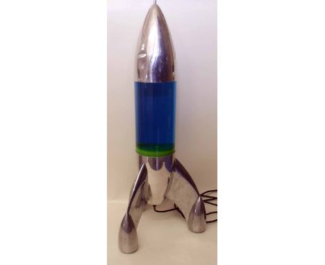 Rocket shaped lava lamp A condition report is not available for this lot.  Damage, defects, restoration or other faults are n