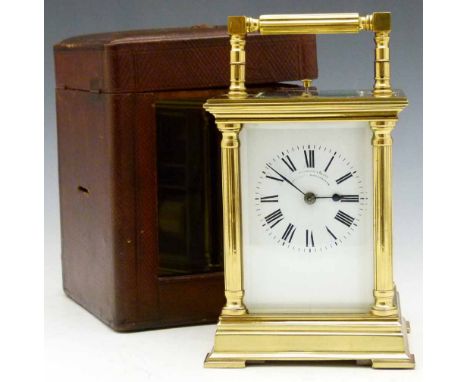 French brass carraiage clock in its travelling case, white enamel Roman dial named Pennington & Batty, Liverpool Manchester, 