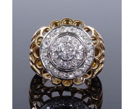 A French 18ct gold diamond cluster cocktail ring, with openwork settings and bridge, central stone approx 0.5ct, total diamon